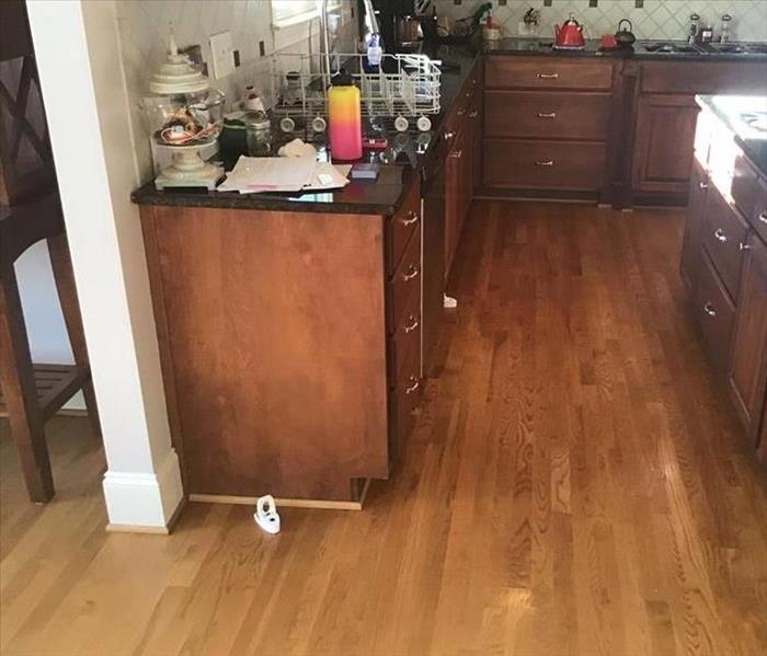 Kitchen, cabinets, island, water damage, wood flooring