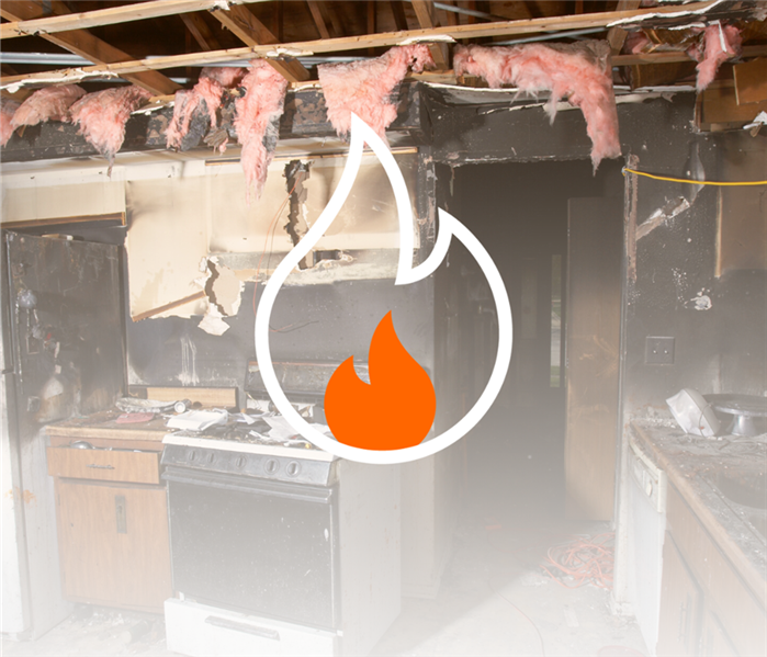 photo showing the aftermath of a kitchen fire with fire icon